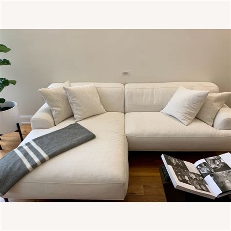 The price of a new Article Abisko Mist Gray Fabric Left Chaise Sectional as of 2023-05-10 is 1599. . Article abisko sectional